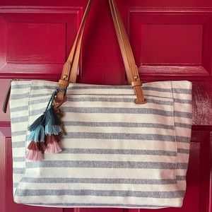 Fossil “Rachel” white & navy striped Tote with tassel and key charm